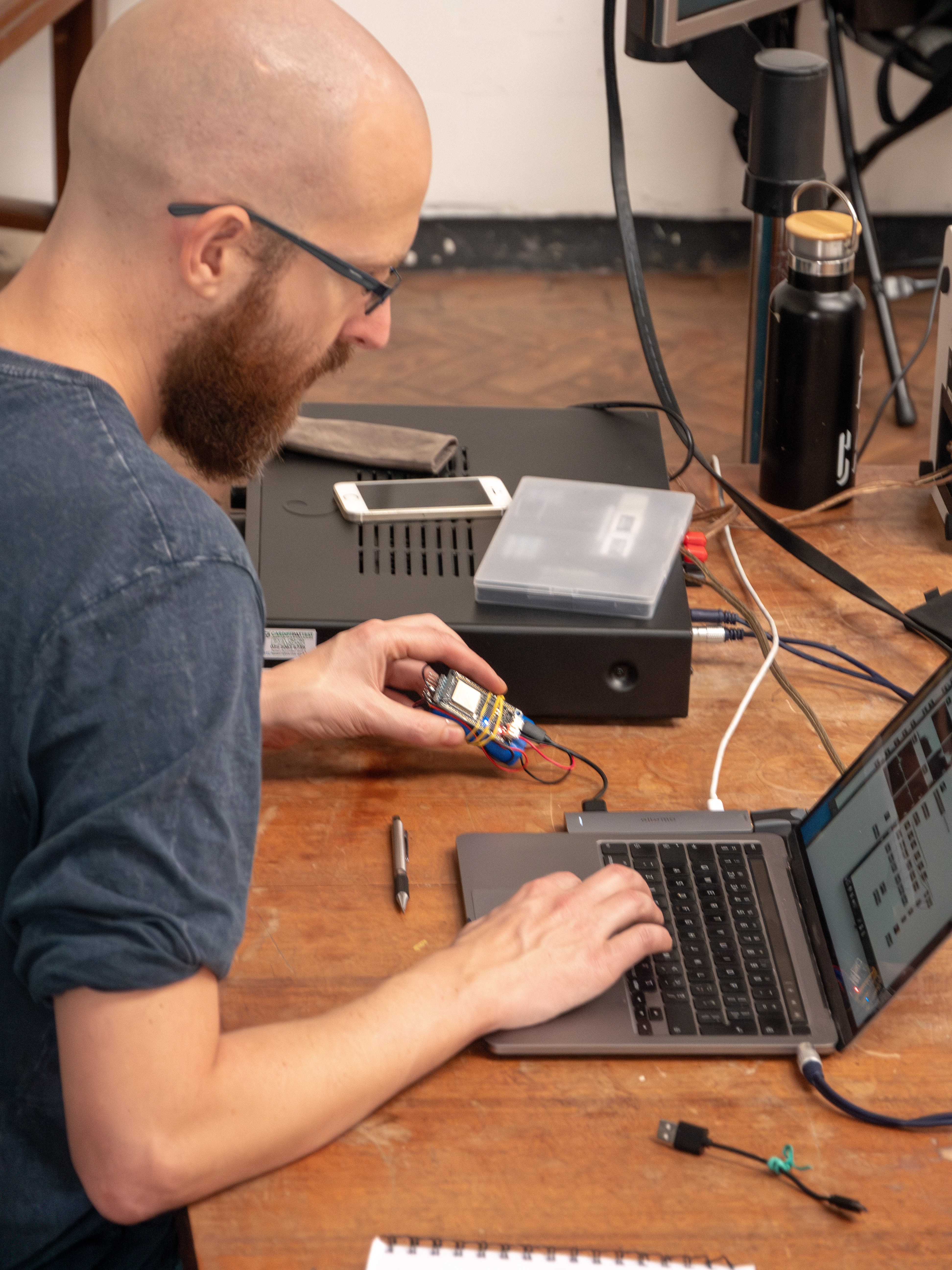 Richard working with a laptop during Sound & Movement